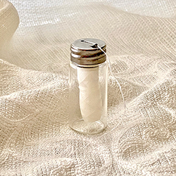 Buy Mint Floss, in a Glass Dispenser with a Chrome Screw Lid, 32yds at The Surf Haberdashery